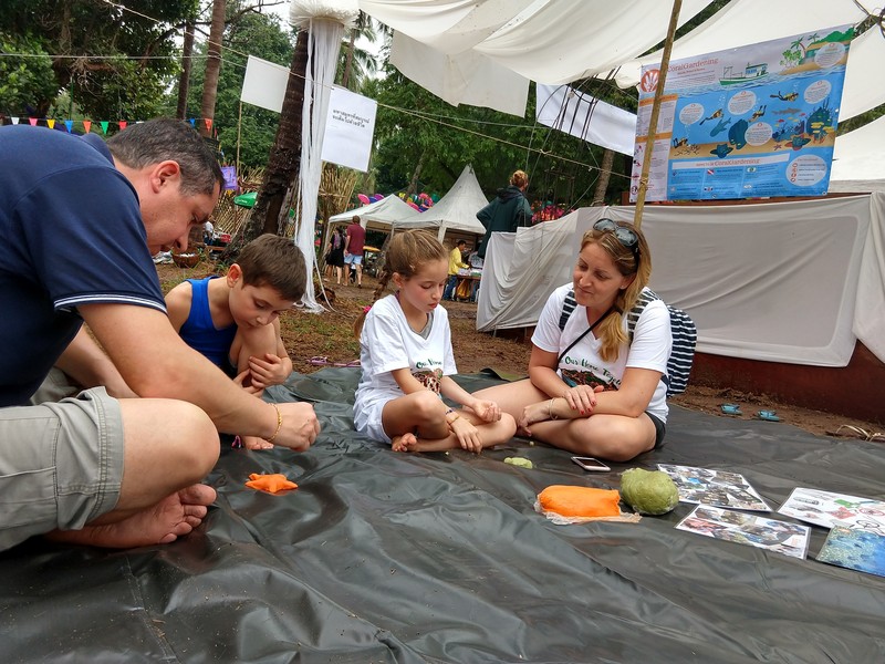 Young and old are designing a house for fishes.